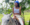 Image of a young girl riding a horse outdoors
